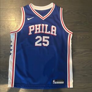 Simons Blue Basketball Jersey with Red and White Accents